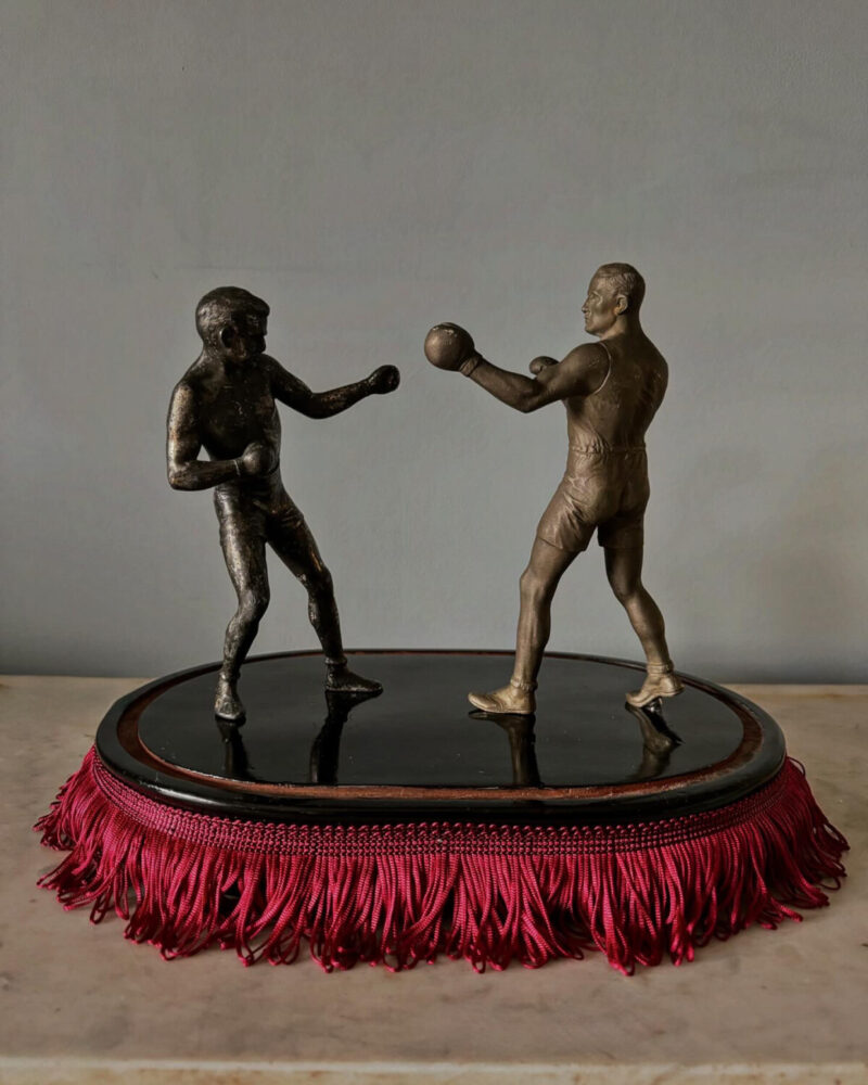 Pair of Boxers in Fringed Base